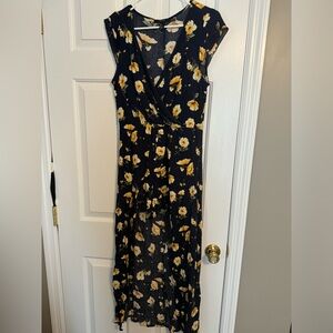 Floral print romper with trail.